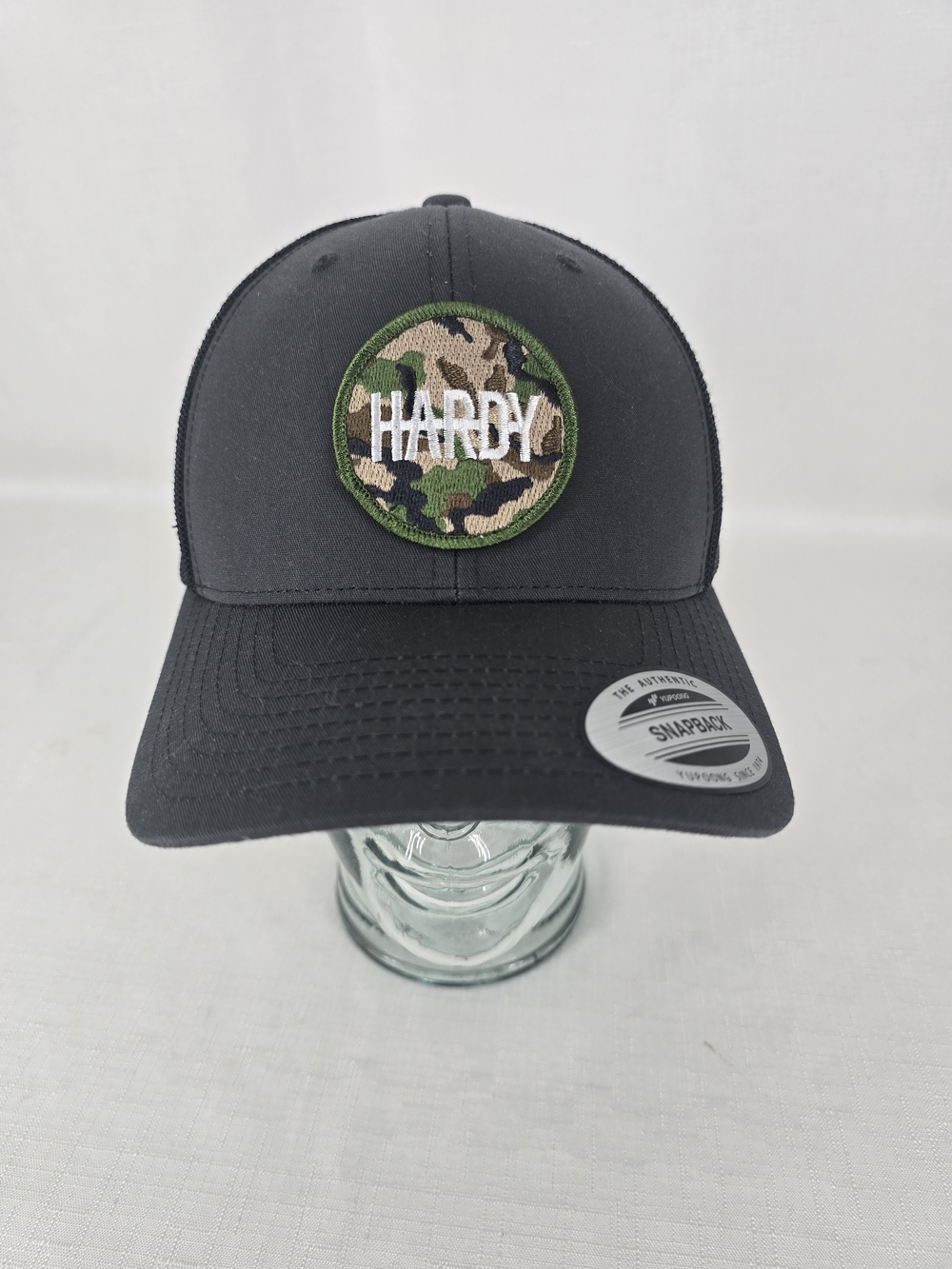 The Classic Black Snapback Hat with Camo Hardy Patch